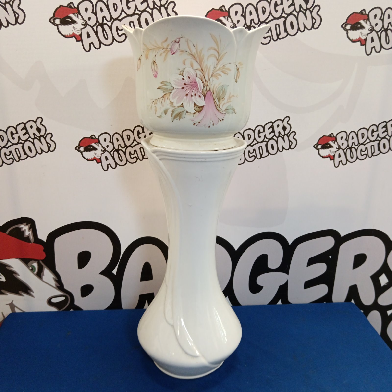 Vintage Royal Winton jardiniere stand with colourful floral decoration.