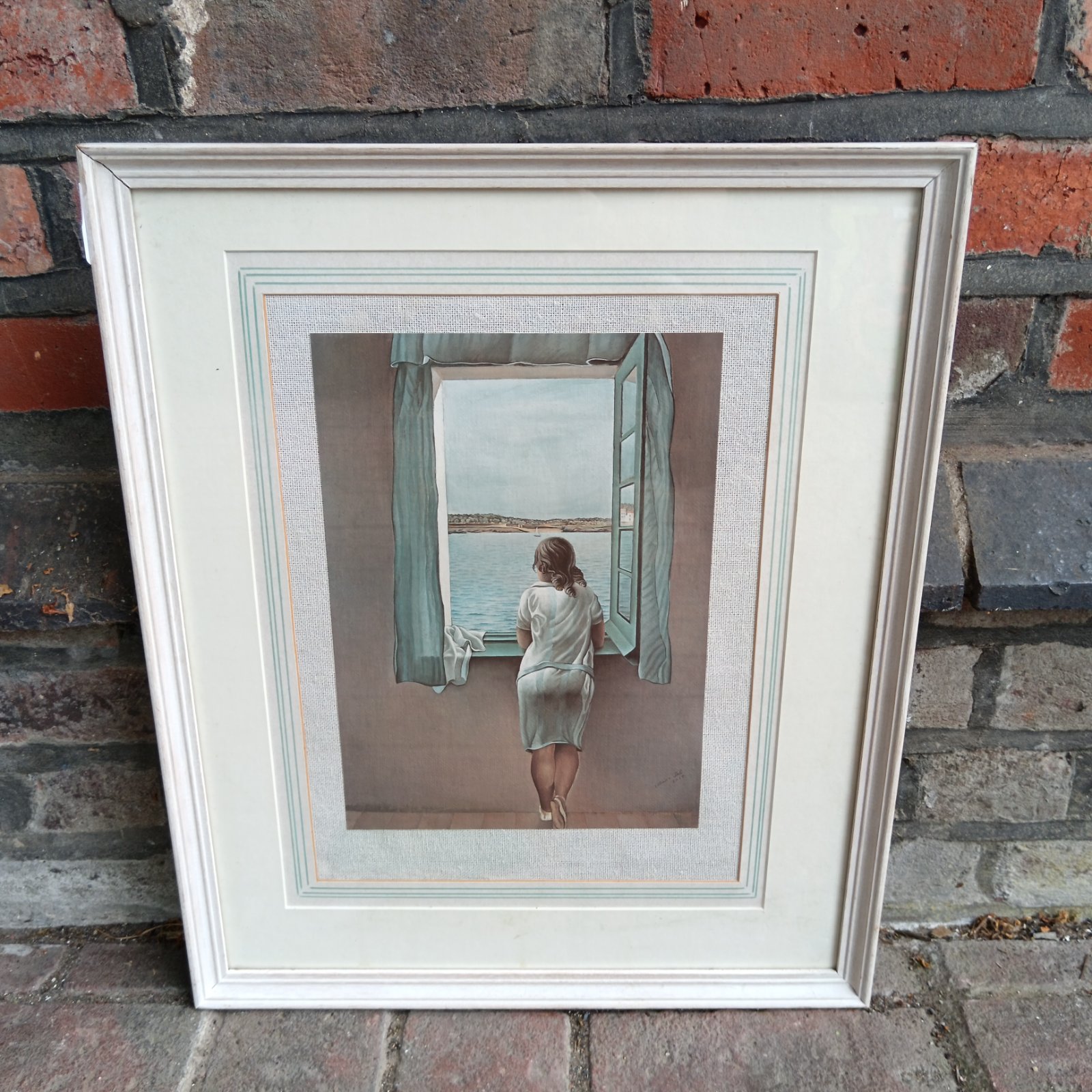 Framed Salvador Dali Studio art print of a young woman at a window.