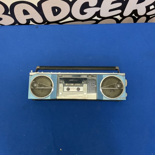 Vintage Sanyo boombox with multiple speakers and cassette player.