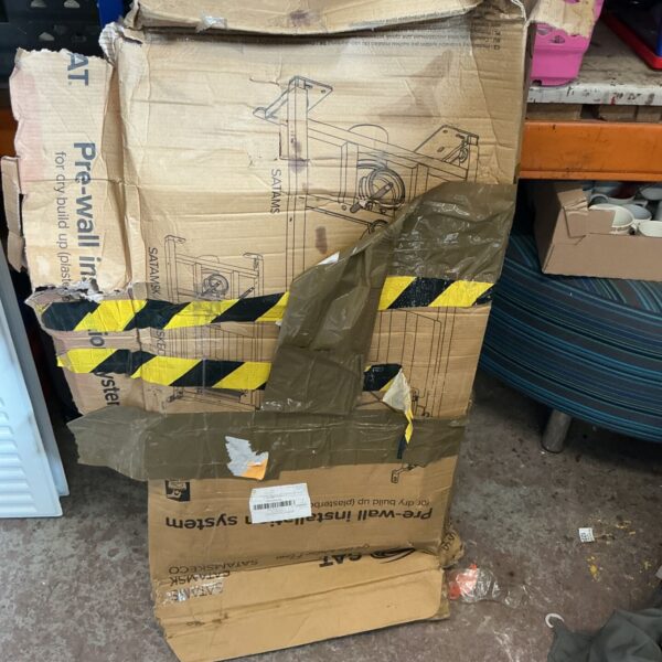 Sat concealed cistern kit with damaged packaging, ready for installation.