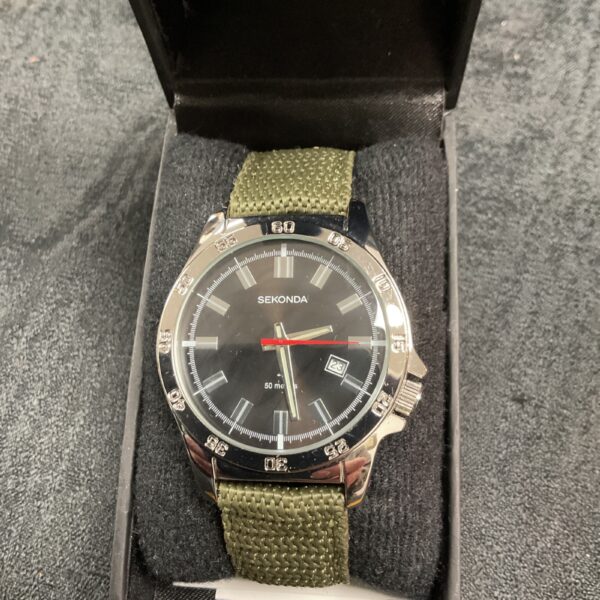 Sekonda military style wristwatch with green canvas strap.