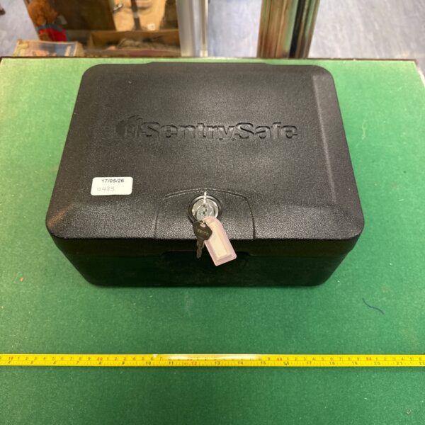 Sentry safe lockbox with keys for secure storage.