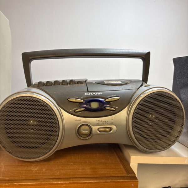 Vintage Sharp QT-CD210 portable CD player boombox with radio.