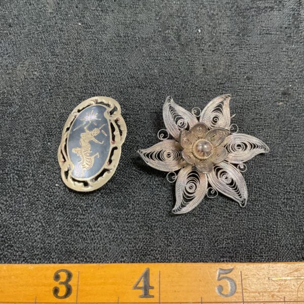 Antique Siamese and silver filigree brooches, vintage jewelry collection.