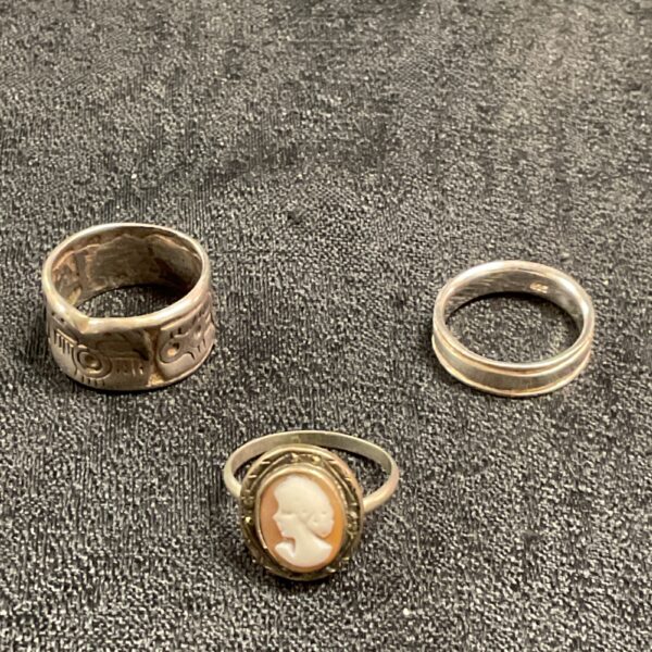 Vintage silver ring with a carved cameo design.