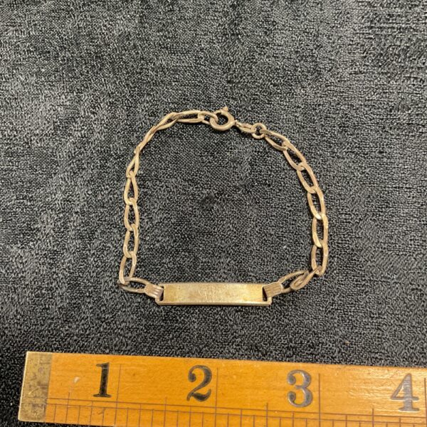 Vintage 925 silver identity bracelet with engraved plaque.