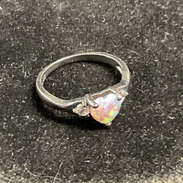 Silver ring with heart-shaped opal and CZ stones, size O.