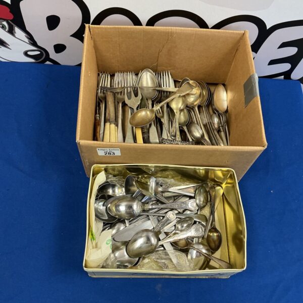 Large collection of vintage silverplate cutlery for dining.
