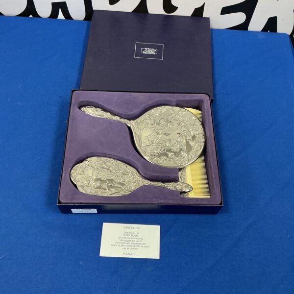 Vintage silverplate vanity set in presentation case.
