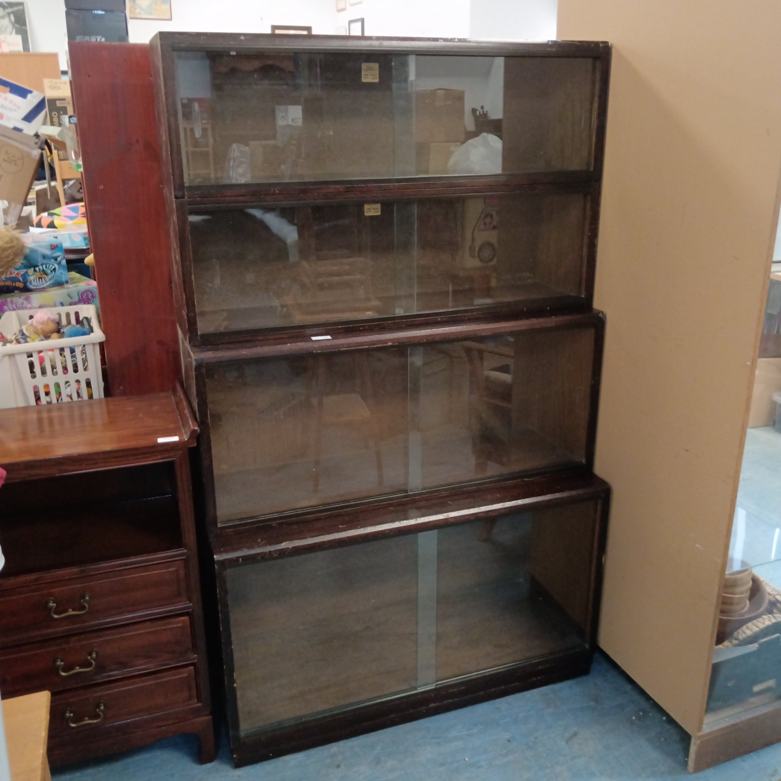Vintage Simplex sectional bookcase with glass fronts.