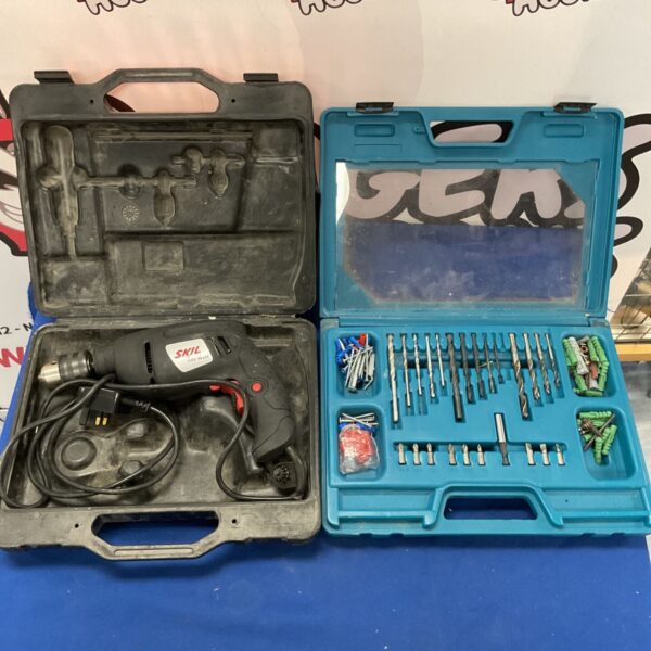 Blue case containing a Skil power drill and Makita drill bit set.