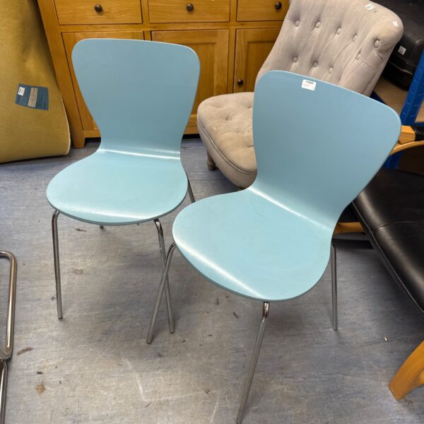 Pair of sky blue bentwood dining chairs with chrome legs.