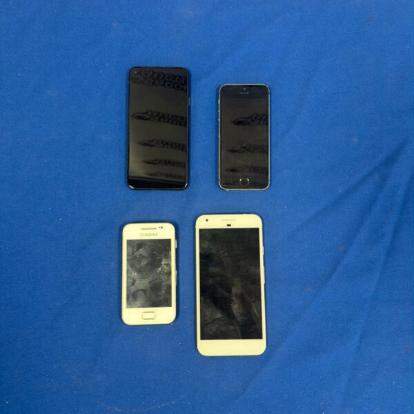 Lot of used smartphones including iPhones, Google Pixels, and Samsung.