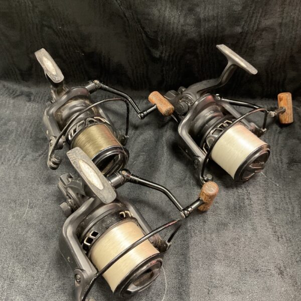 Lot of three used Sonik 1000 carp reels for fishing.