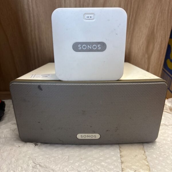 Sonos Play 3 smart speaker with Sonos Bridge networking device.