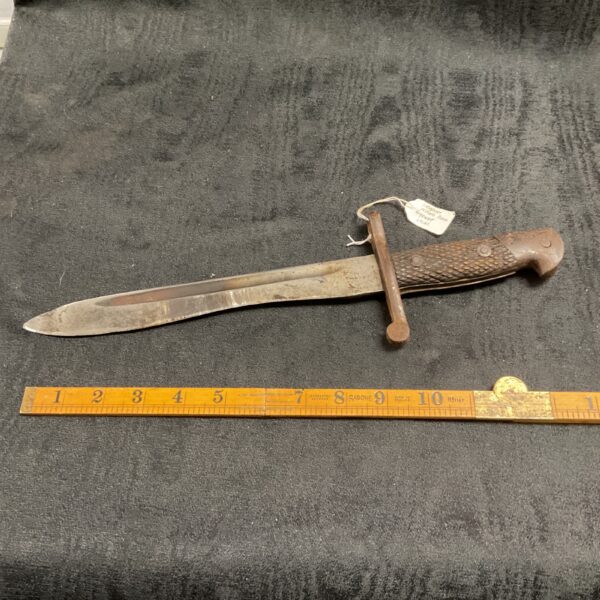 Vintage Spanish bolo bayonet from 1941, a military collectible.