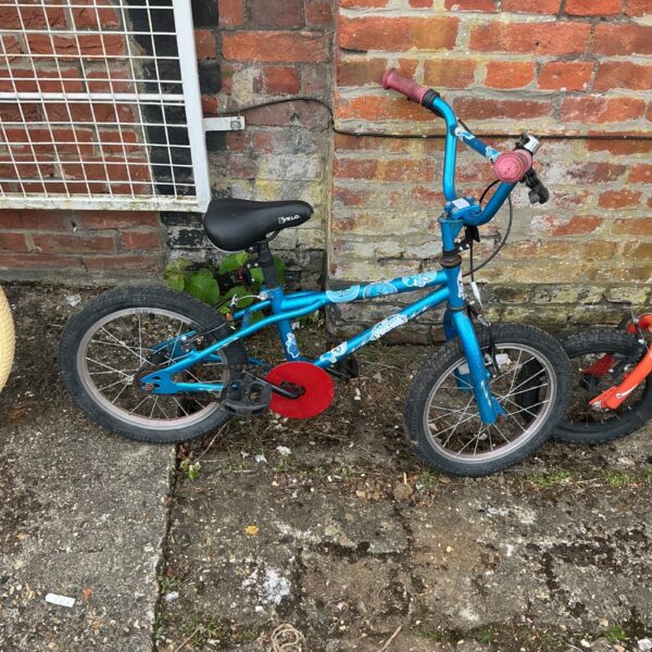 Blue Spider-Man themed child’s bike with stabilisers.