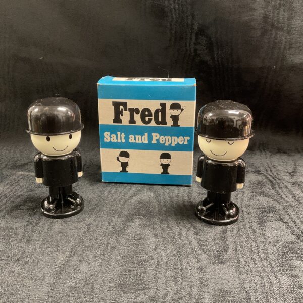 Vintage Spillers Fred salt and pepper shakers in original box.