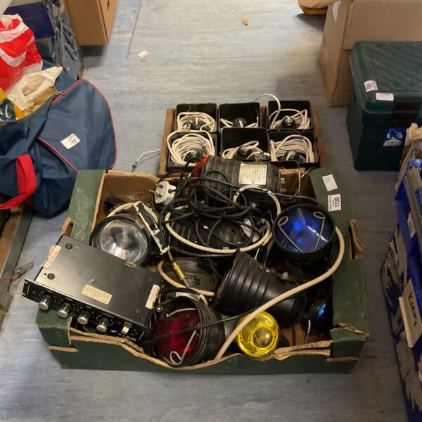 Mixed lot of stage lighting equipment with various lights and cables.