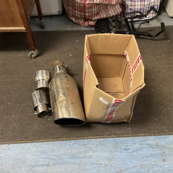 Polished stainless steel universal car exhaust muffler tip.
