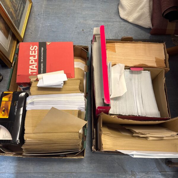 Mixed lot of stationery including envelopes and paper goods.