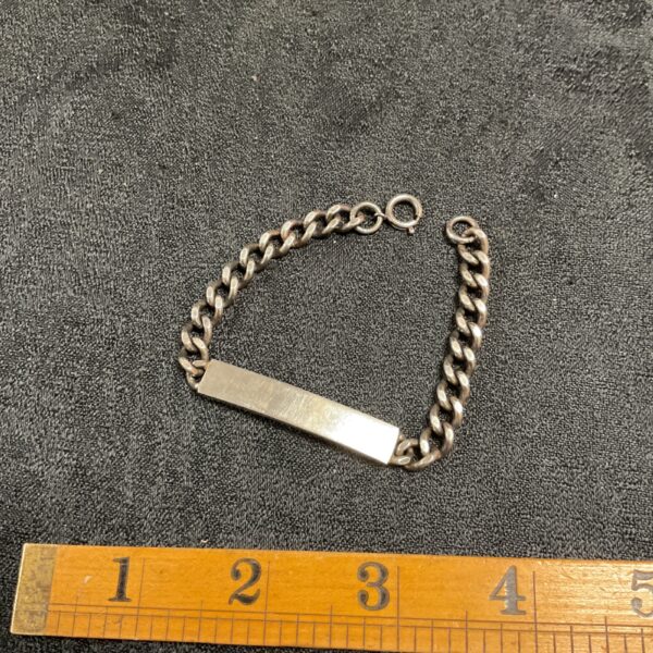 Hallmarked sterling silver identity bracelet with blank cartouche.