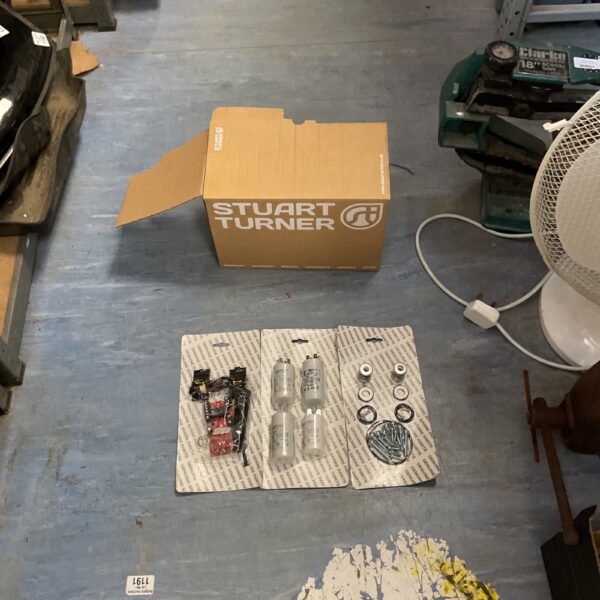 Stuart Turner pump repair kit with spare parts in original packaging.