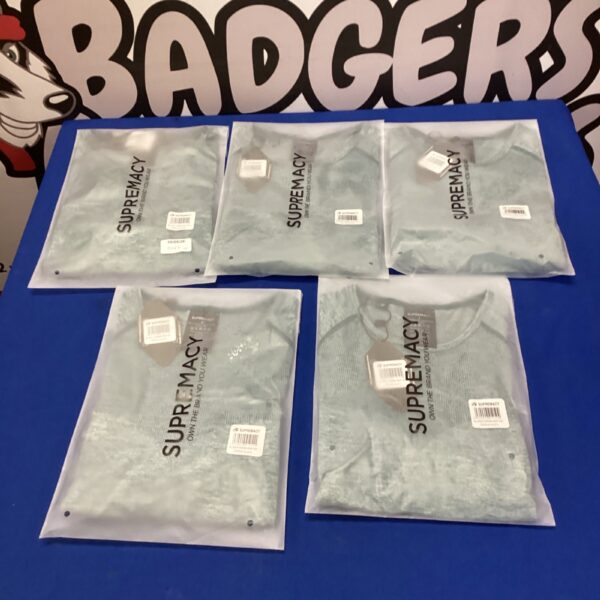 Lot of five Supremacy gym tops in sizes M & S.