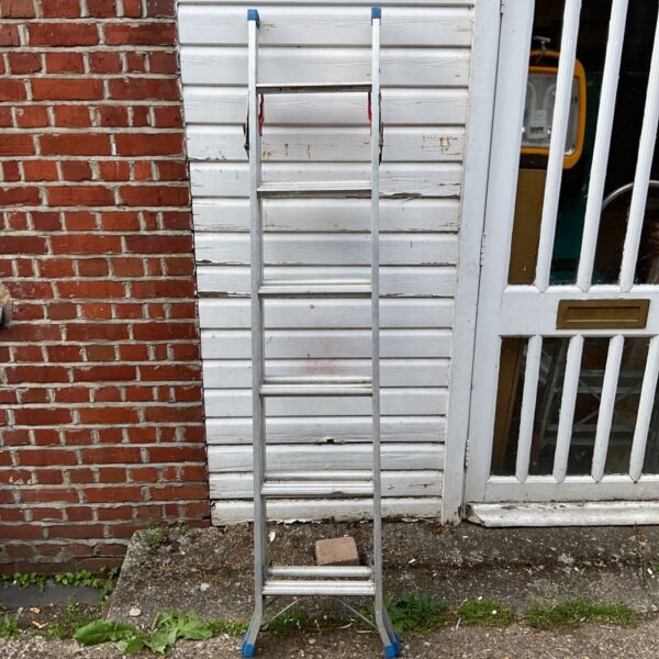 Silver Suprills aluminium scaffolding ladder in used condition.