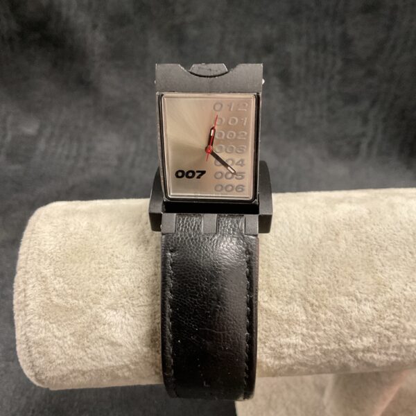 Front view of the Swatch 007 Die Another Day watch with rotating display.
