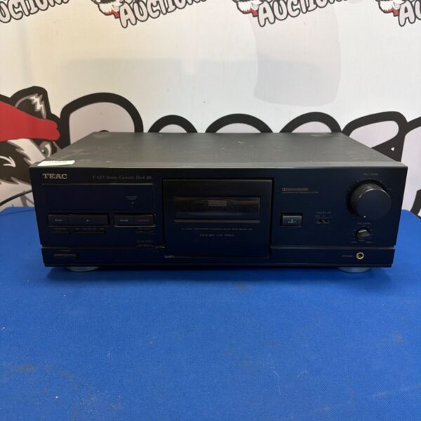 Vintage TEAC V-615 stereo cassette deck with front panel controls.