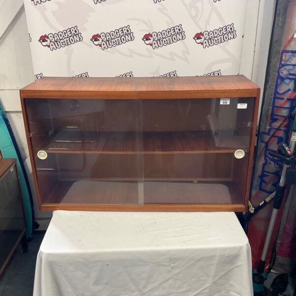 Modern teak display cabinet with glass doors, vintage style.