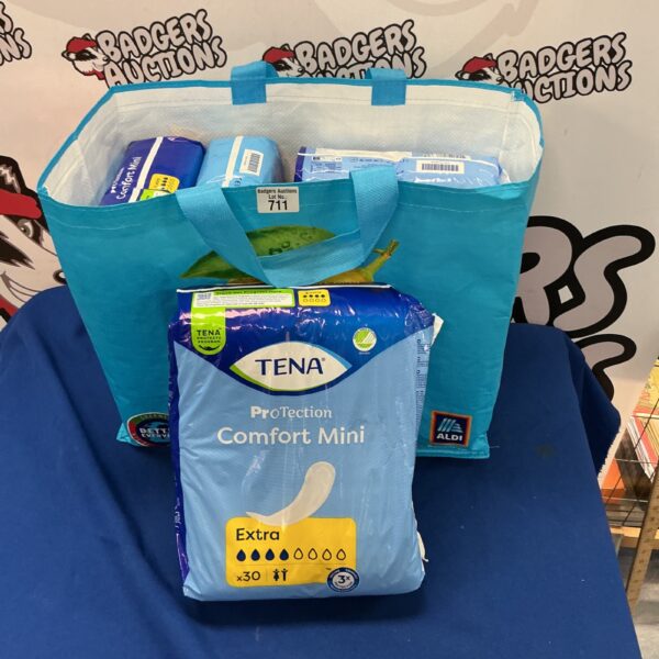 Sealed bag of Tena Pro Tectonic incontinence pads for adult care.