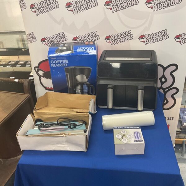 Black Tesco coffee maker presented for auction.