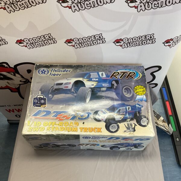 Thunder Tiger DT10 RC stadium truck, off-road vehicle.