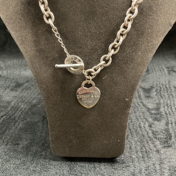 Vintage Tiffany & Co. T bar necklace with silver chain and pendant.