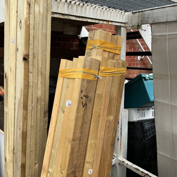Bundles of 5’6” timber planks for construction projects.