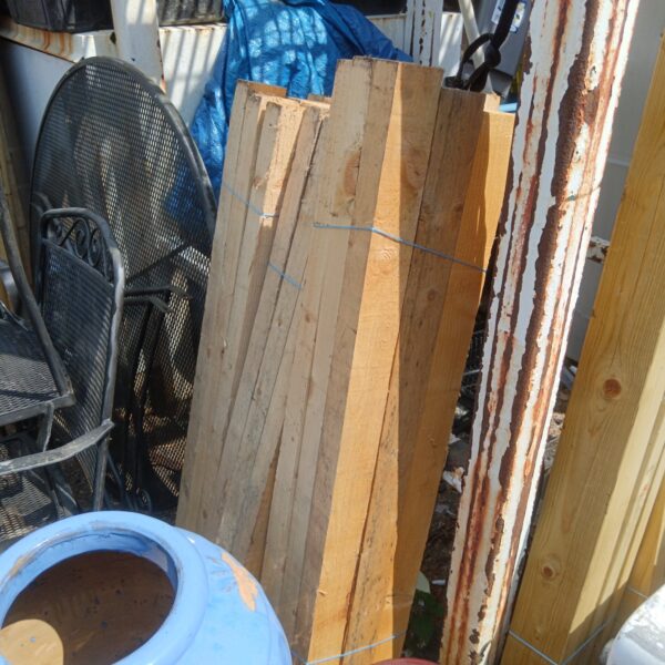 Three bundles of 3ft timber planks for DIY projects and construction.