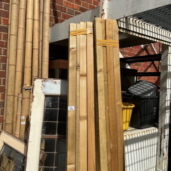 Stacked bundles of 6’6” timber for construction and DIY projects.