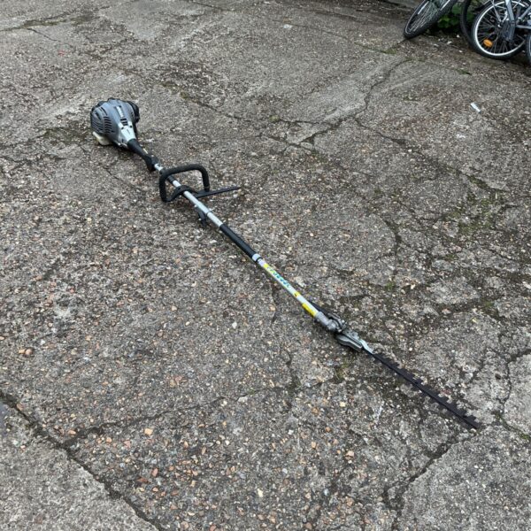Used Titan petrol strimmer hedge cutter for garden maintenance.