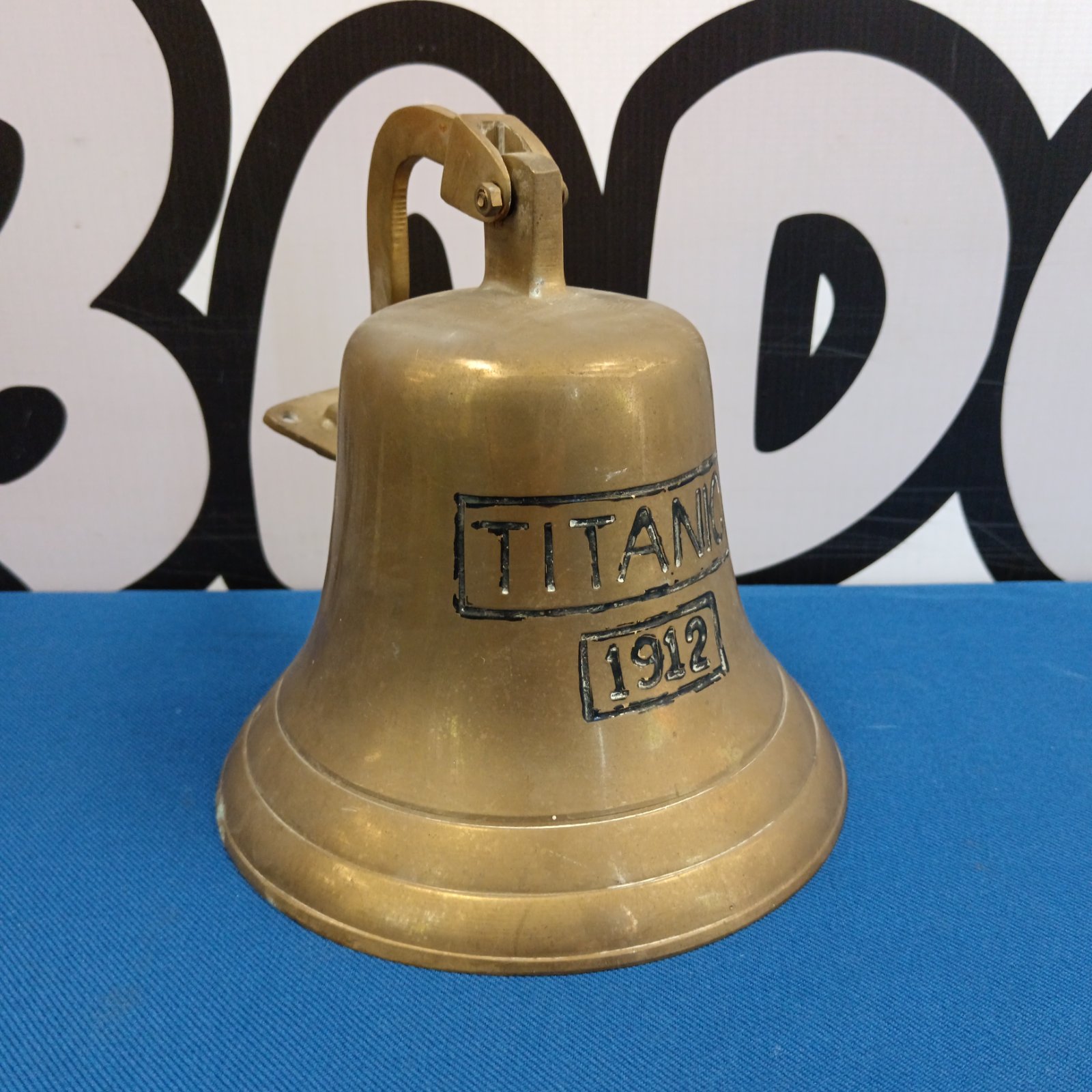 Brass Titanic 1912 reproduction bell, nautical collectible.
