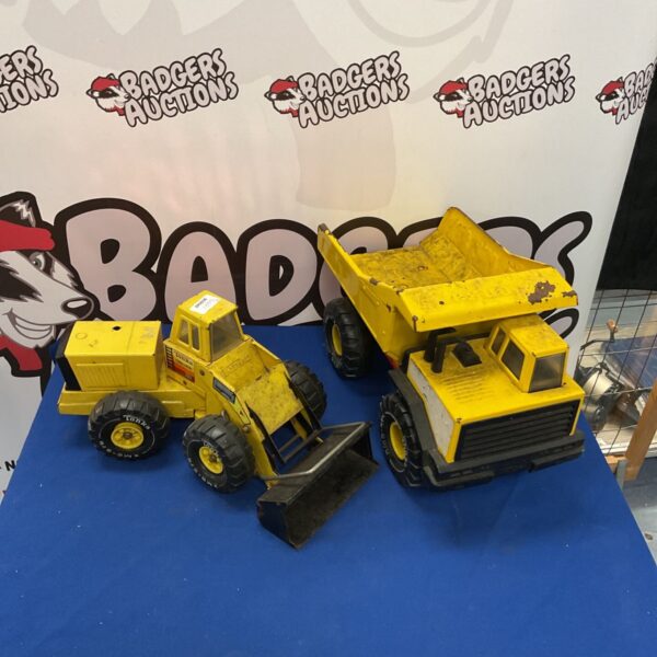 Yellow Tonka excavator and dumper truck set for collectors.