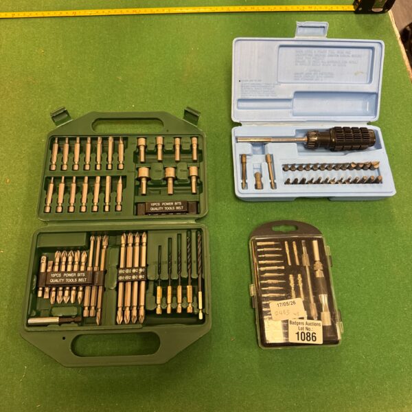 New tool accessory sets in original packaging, ready for use.