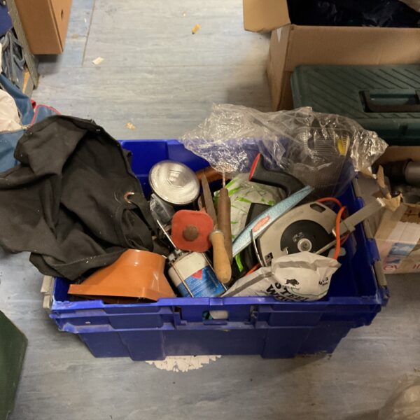 Mixed lot of tools and a camping stove in a blue crate.