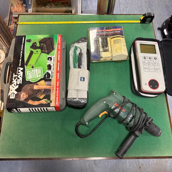 Tool and hardware lot including a Bosch drill and PAT tester.