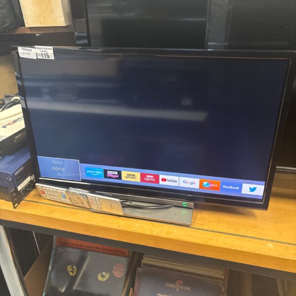 Black Toshiba 24 inch LCD television with remote control.