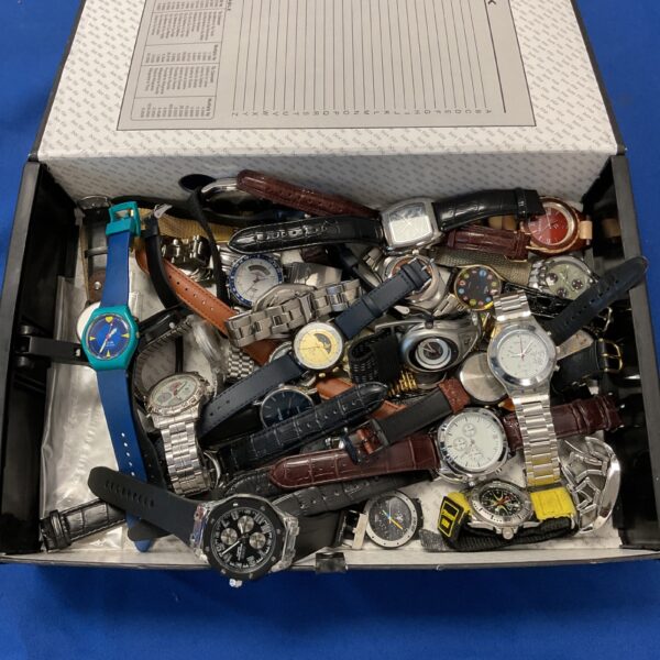 Tray of assorted wrist watches including Zeon and Timex brands.