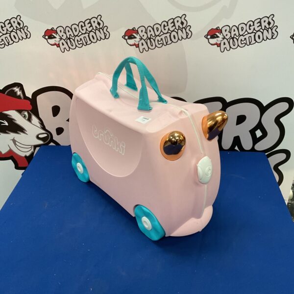 Bright blue Trunki childrens suitcase with wheels for easy travel.