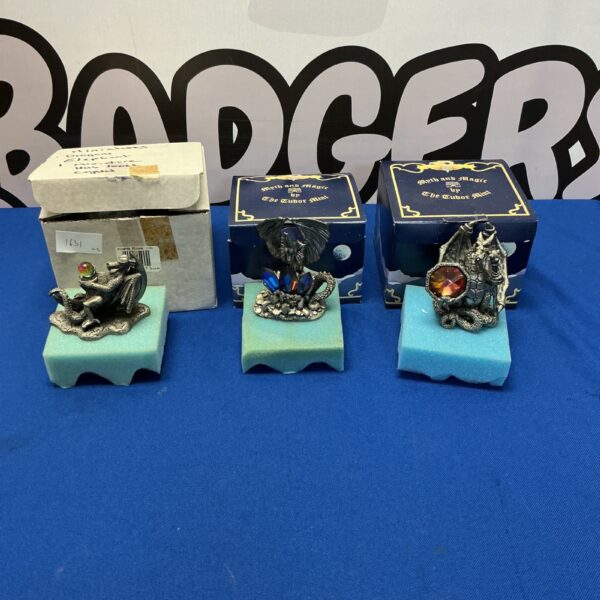 Tudor Mint dragon figures lot, detailed metal fantasy collectibles.