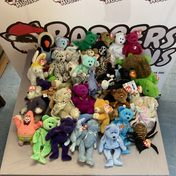 Large collection of colourful TY Beanie Babies plush toys.